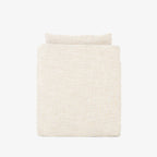 Fauteuil pivotant Four Hands Banks en cambric ivoire