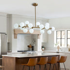 Lustre linéaire moderne du milieu du siècle de 101,6 cm (40 po), suspension Sputnik en laiton doré à 16 lumières avec globe en verre dépoli pour salle à manger