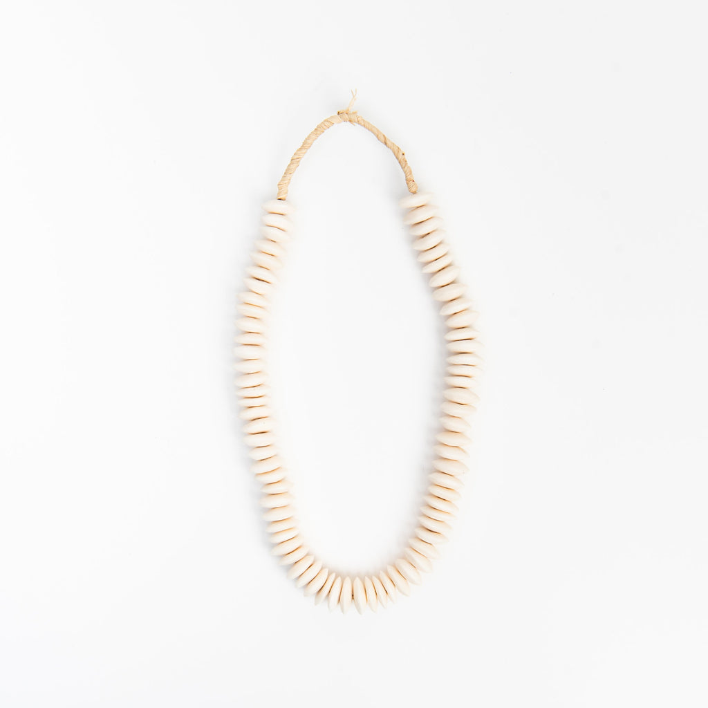 Perles en os blanc soucoupe