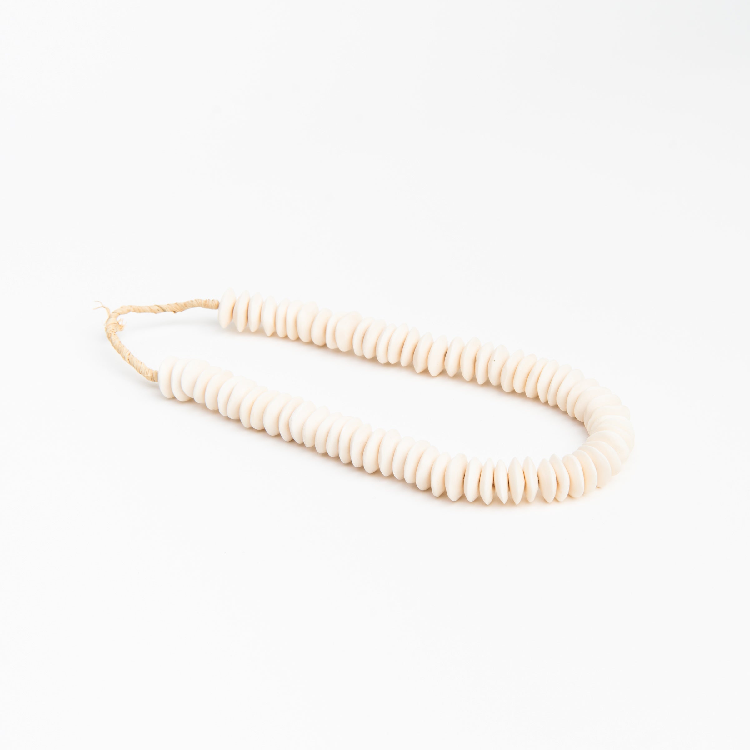 Perles en os blanc soucoupe