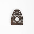 Dessous de plat en fer vintage triste