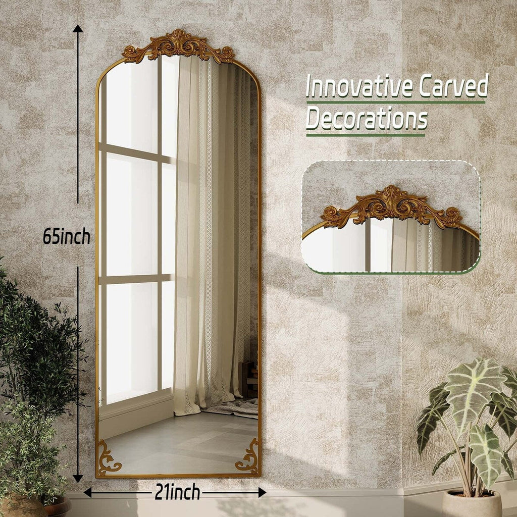 Miroir sur pied arqué à motif floral baroque