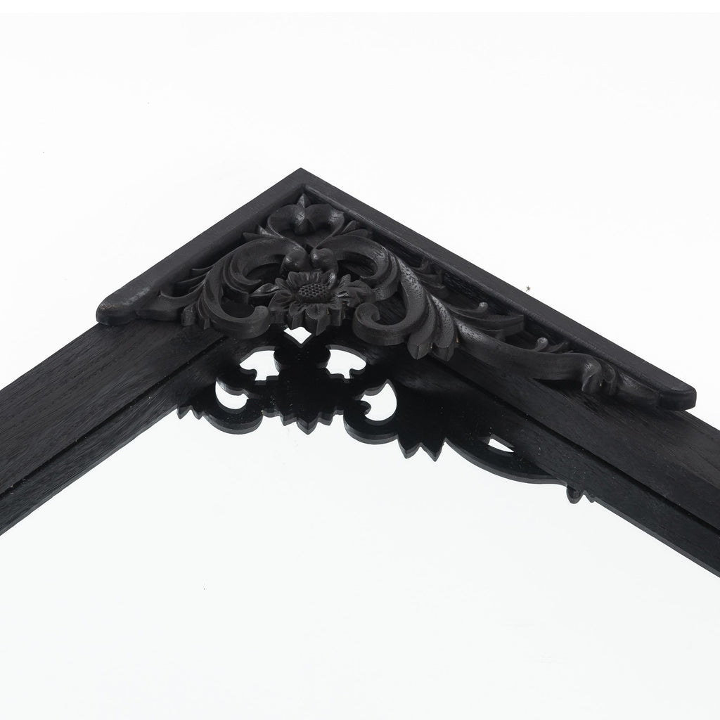 Miroir sur pied arqué en bois massif sculpté