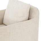 Fauteuil pivotant Four Hands Banks en cambric ivoire