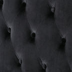 Canapé deux places à oreilles haut capitonné en velours noir