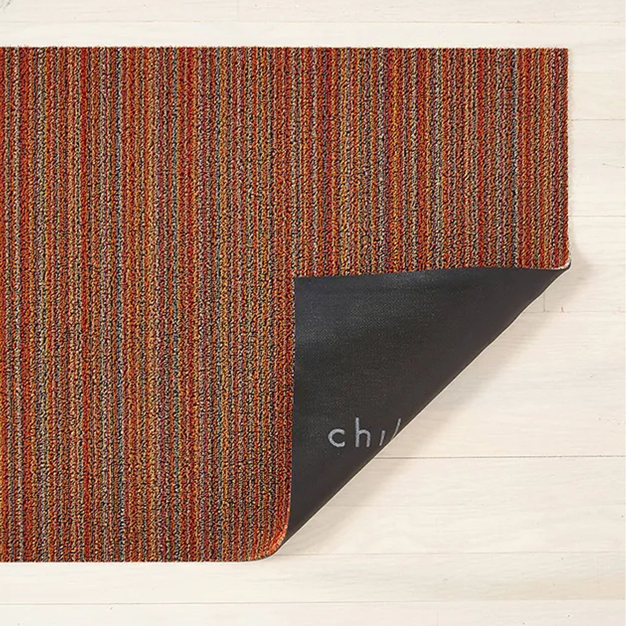 Tapis à poils longs à fines rayures orange Chilewich 