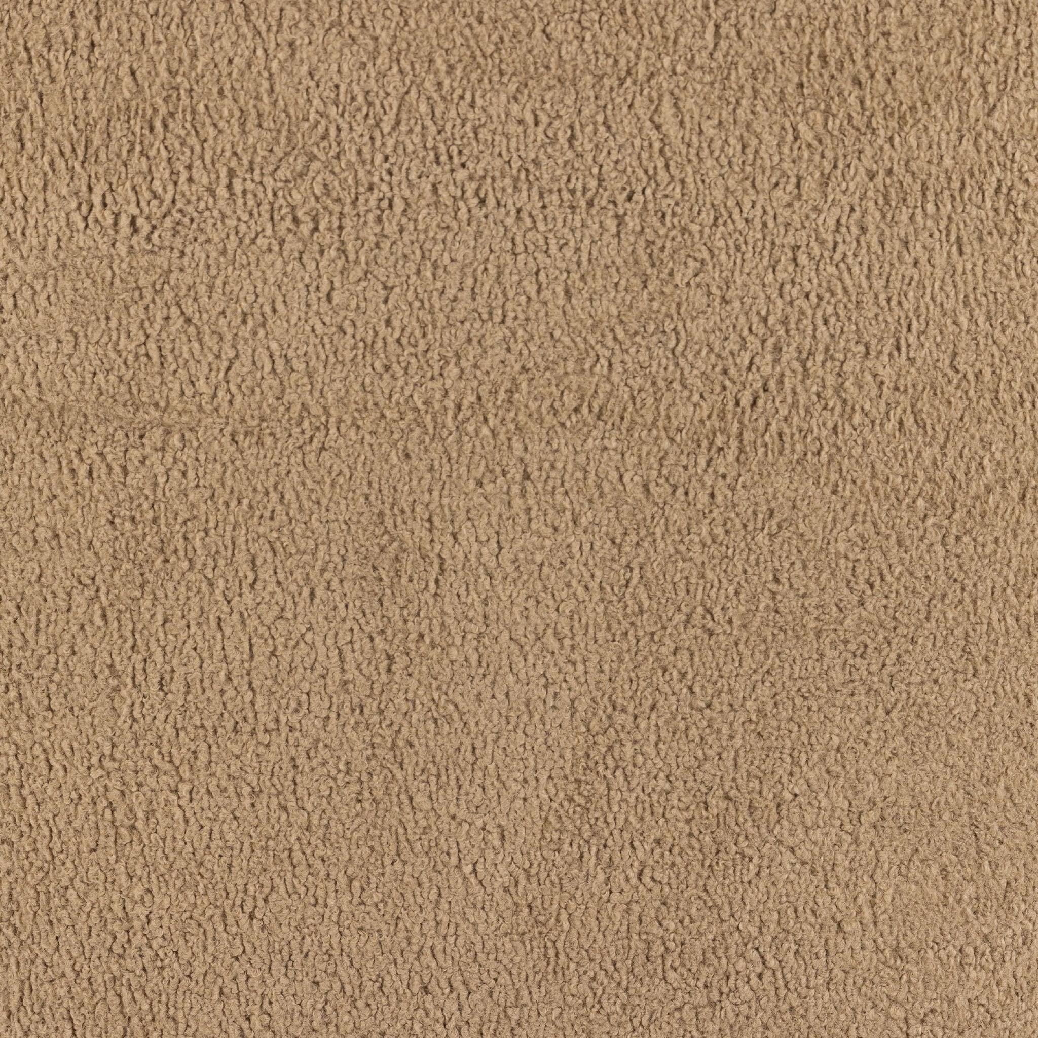 Fauteuil pivotant Four Hands Kadon en peau de mouton camel