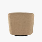 Fauteuil pivotant Four Hands Kadon en peau de mouton camel