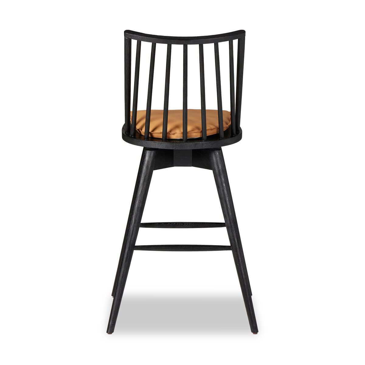 Tabouret de bar pivotant Lewis de Four Hands avec coussin en forme de selle de whisky