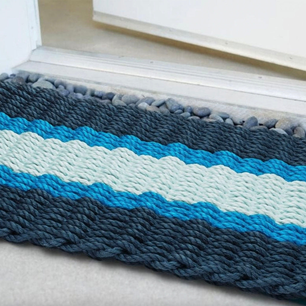 Tapis d'extérieur en corde de homard, coloris marine, bleu clair et vert d'eau
