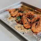 Cuisiné dans un quart de plaque