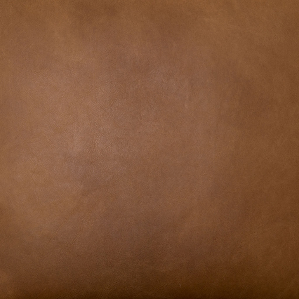 Fauteuil Silas Four Hands en cuir cuivré patiné